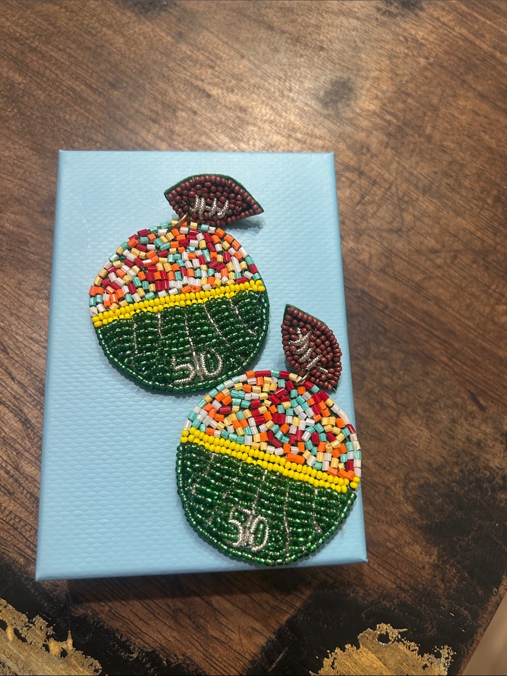 Beaded Multicolor Football Earrings with Green Accent